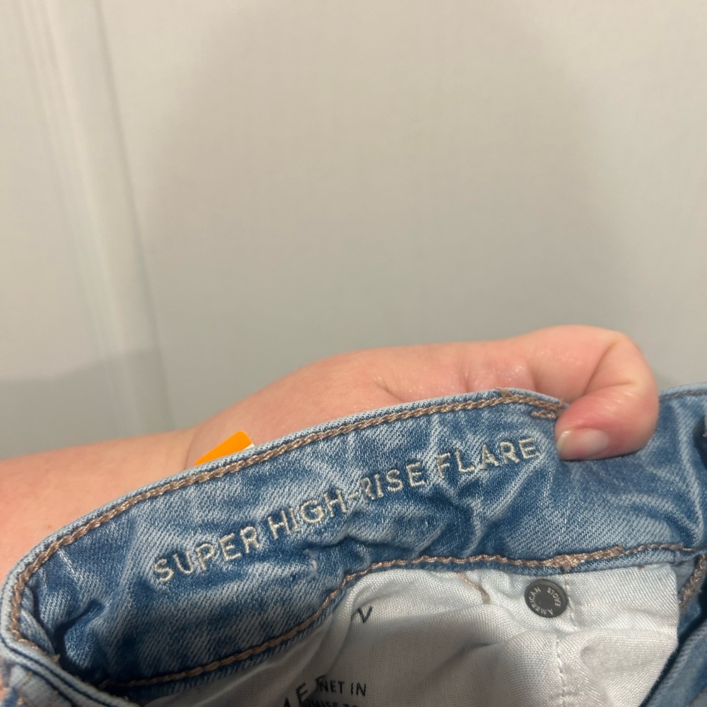 American Eagle Outfitters Light Blue Super High Rise Flare Distressed Jeans - Picture 7 of 7